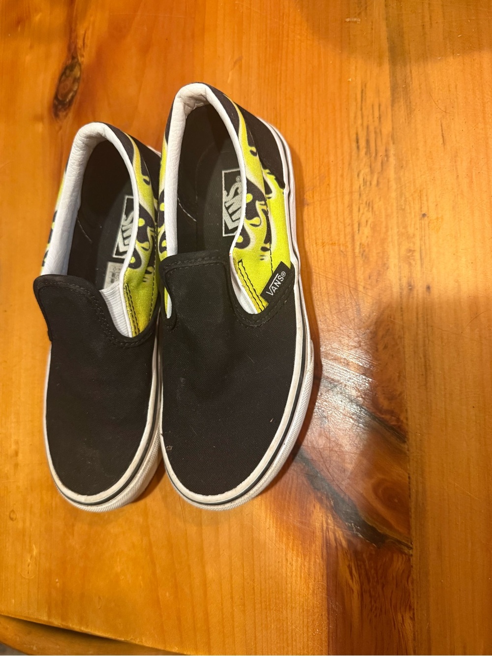 Vans Kids Slip-On Sneakers in Black with Yellow